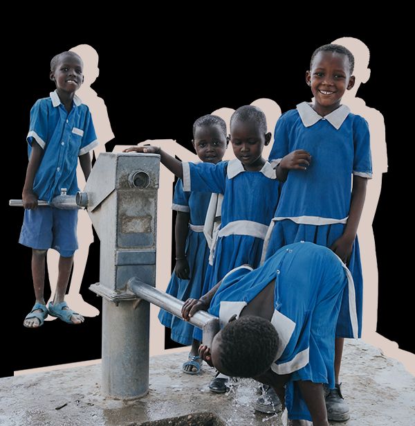 Children accessing clean water from a well in East Africa